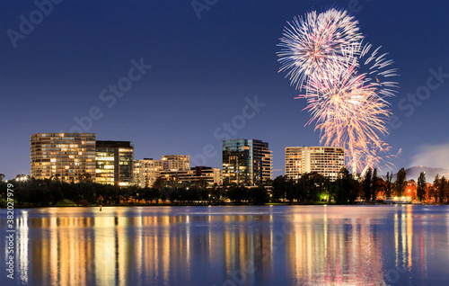 Fireworks celebration over the city lights