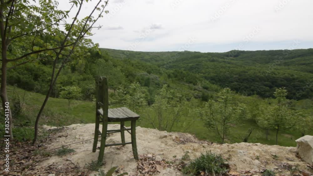 An old chair on a mountain An old chair on a mountain