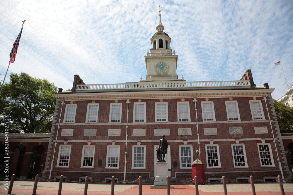 View of Independence Hall with Bronze sculpture of George Washington in Philadelphia Pennsylvania, USA