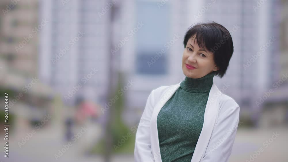 portrait of a business pretty woman outdoors looking at the camera portrait of a business pretty woman outdoors looking at the camera