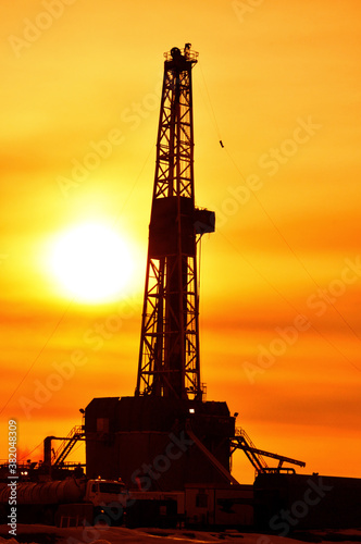 The drilling rig during sunset