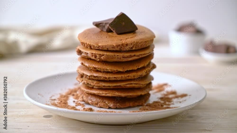 chocolate pancake stack with chocolate powder chocolate pancake stack with chocolate powder