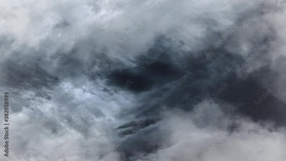 clouds fly, clouds move from light to dark parts with a storm of storms in them clouds fly, clouds move from light to dark parts with a storm of storms in them