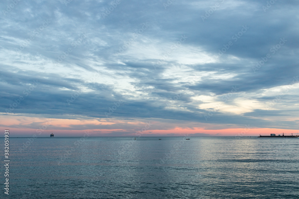 Amazing sscenic view of the harbor and the sunset of the Mediterranean Sea, with blue water, Mallorca, Spain, Europe Amazing sscenic view of the harbor and the sunset of the Mediterranean Sea, with blue water, Mallorca, Spain, Europe