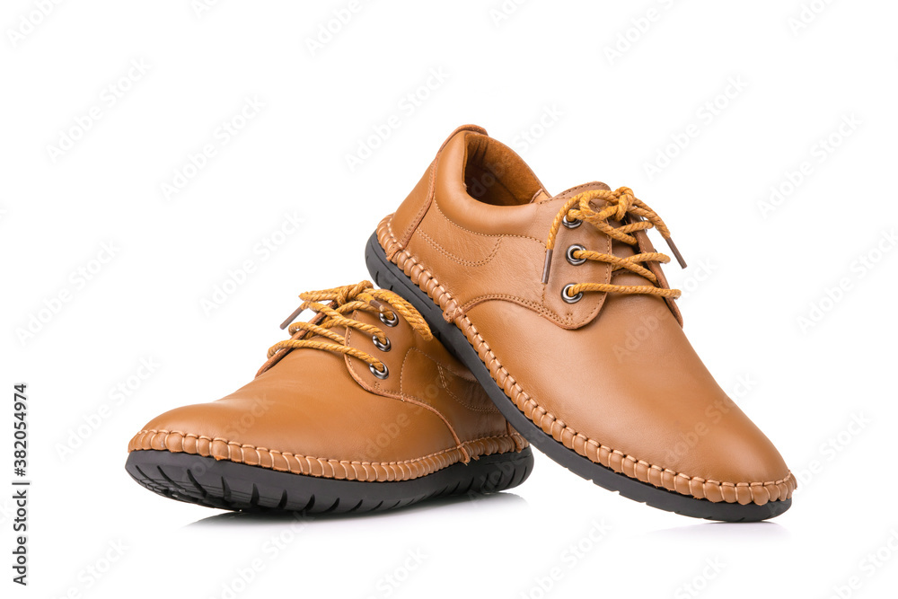 New brown men leather shoes. Studio shot isolated on white