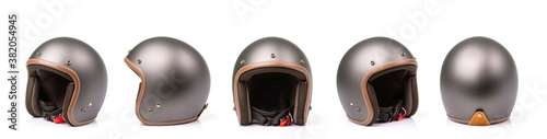 Close up set of new grey vintage helmet. Studio shot isolated on white photo