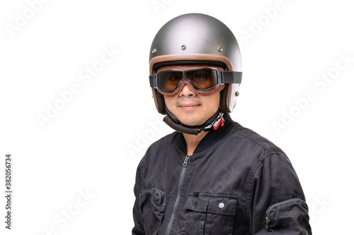 Motorcyclist or rider wearing vintage helmet. Safe ride campaign concept. Studio shot isolated on white © SKT Studio