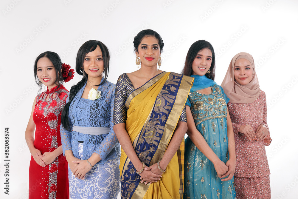 South east Asian Malay Chinese Indian race ethnic origin woman wearing  dress costume baju kurung cheongsam samfu kebaya Sharee multiracial  community on white background Stock-foto | Adobe Stock