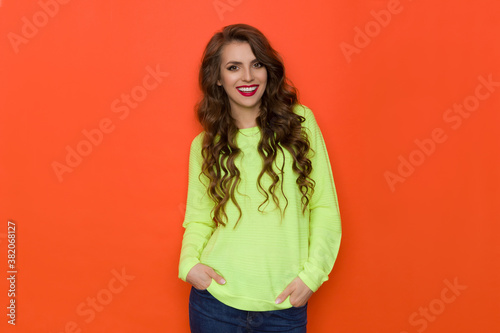 Happy Young Woman In Lime Green Vibrant Sweater