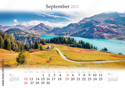 Calendar September 2021, B3 size. Set of calendars with amazing landscapes. Aerial morning view of Roselend lake/Lac de Roselend. Picturesque autumn scene of Alps mountain, France. photo