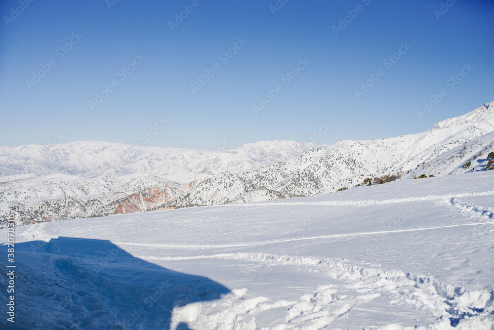 The mountain resort of Beldersay, Uzbekistan. Panorama of the mountains from the pass in winter