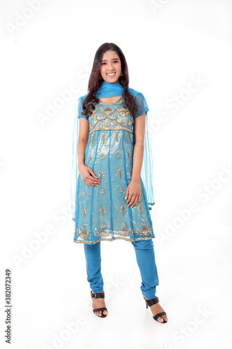 South east Asian Indian race ethnic origin woman wearing Indian dress costume salwar kameez multiracial community on white background photo