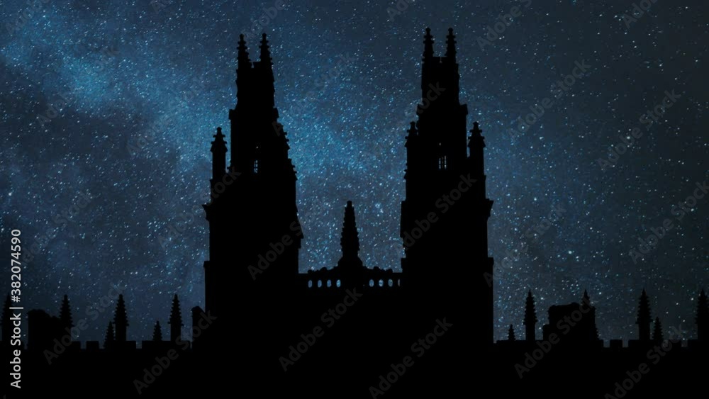 Oxford University: Time Lapse by Night with Stars, Milky Way and Towers of College in Silhouette, Oxfordshire, England Oxford University: Time Lapse by Night with Stars, Milky Way and Towers of College in Silhouette, Oxfordshire, England
