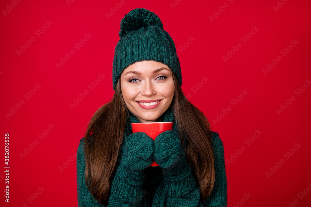 Close-up portrait of her she nice attractive lovely charming cheerful girl drinking hot beverage wintertime isolated over bright vivid shine vibrant red color background Close-up portrait of her she nice attractive lovely charming cheerful girl drinking hot beverage wintertime isolated over bright vivid shine vibrant red color background