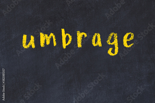 Photos Black chalkboard with inscription umbrage on in