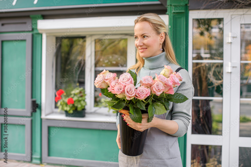 Fototapeta premium Floristry concept. bouquet of beautiful flowers. Spring colors. the work of the florist at a flower shop
