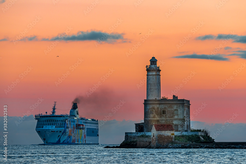 Lighthouse on the island of Mouth, at the entrance to the port of Olbia, Sardinia - Italy