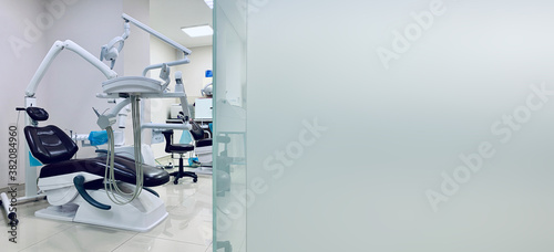 Special equipment for a dentist. Modern dentist's chair in a medical room.