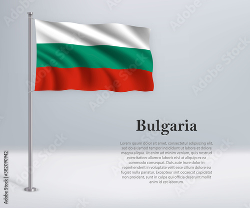 Waving flag of Bulgaria on flagpole. Template for independence day