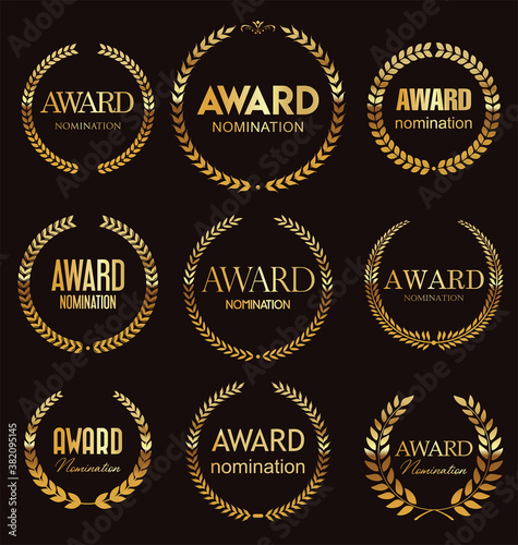 Golden award signs with laurel wreath isolated on black background
