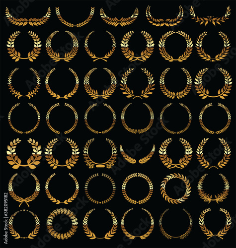 Golden  laurel wreath isolated on black background