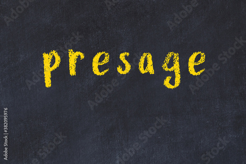Foto Black chalkboard with inscription presage on in