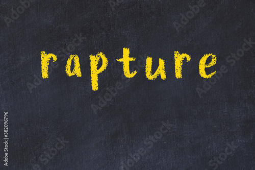 Tableau sur toile College chalk desk with the word rapture written on in