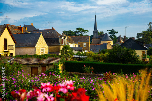 Picturesque view of houses and church of Grez-Neuville commune in Maine-et-Loire department, western France photo