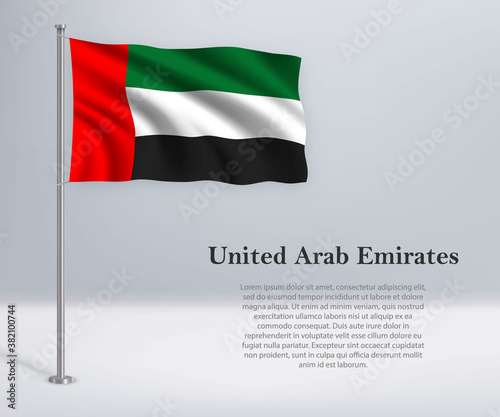 Waving flag of United Arab Emirates on flagpole. Template for independence day