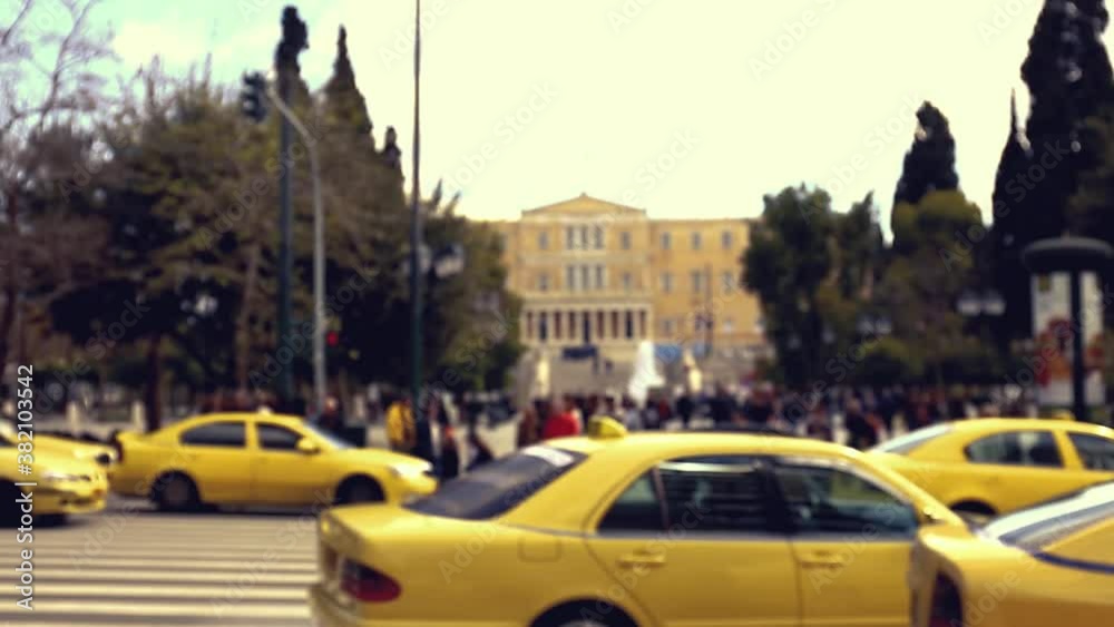 Road traffic near Parliament and Syntagma square in Athens, Greece
