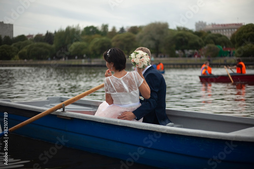 The bride and groom on the boat.