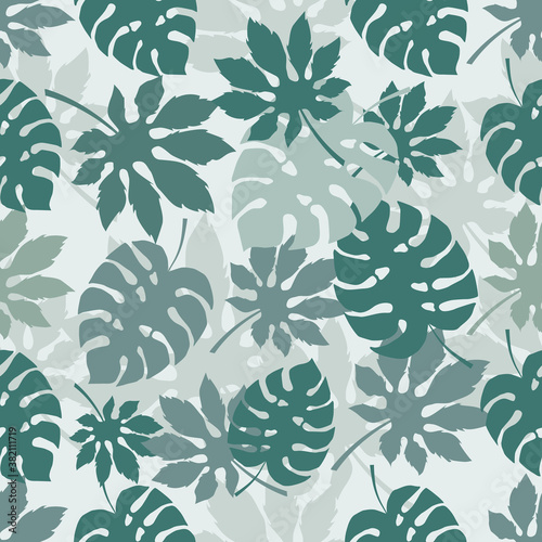 Tropical leaves seamless pattern on light blue background. Monstera leaves botanical pattern. Vector background for wrapping paper and digital paper design.