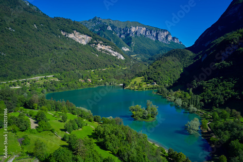 Mountain lake in the alps of Italy. Turquoise lake in the mountains. Aerial view of Lake Tenno in autumn, Trento, Italy, Europa.