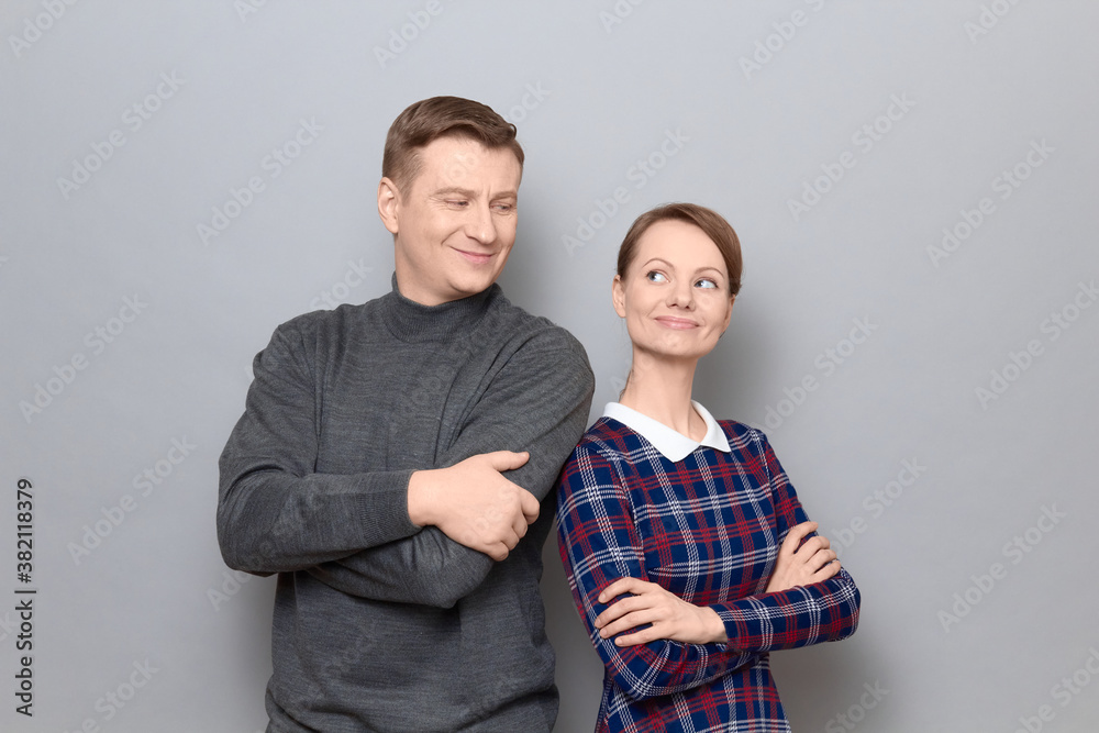Portrait of man and woman with happy expressions on faces Portrait of man and woman with happy expressions on faces