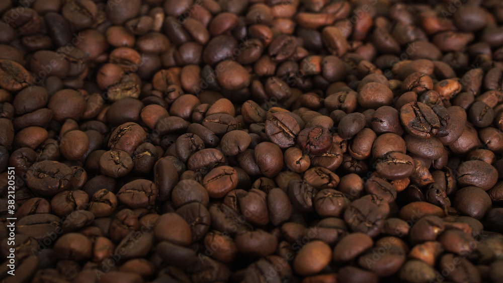 Fototapeta premium Close-up of coffee beans background with focus selected