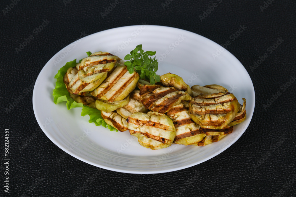 Grilled eggplant slices served basil Grilled eggplant slices served basil