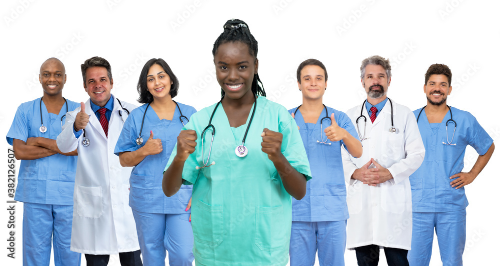 Pretty afro american female nurse with doctor and medical team Pretty afro american female nurse with doctor and medical team