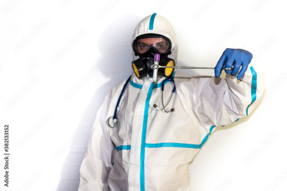 doctor in safety suit on white background. protection against coronavirus. doctor in safety suit on white background. protection against coronavirus.