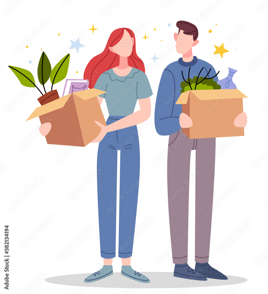Young couple in modern clothes are moving to a new home.Couple in new home with cardboard boxes. People moving house. Young couple in modern clothes are moving to a new home.Couple in new home with cardboard boxes. People moving house.