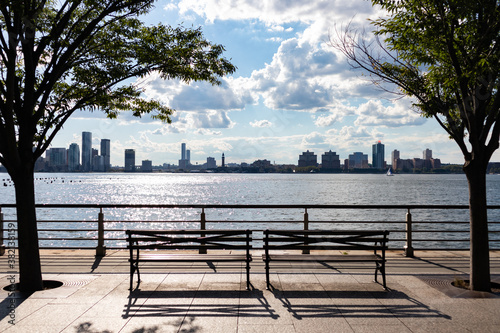 Fotografia, Obraz New York City Riverfront along the Hudson River with Benches looking towards the