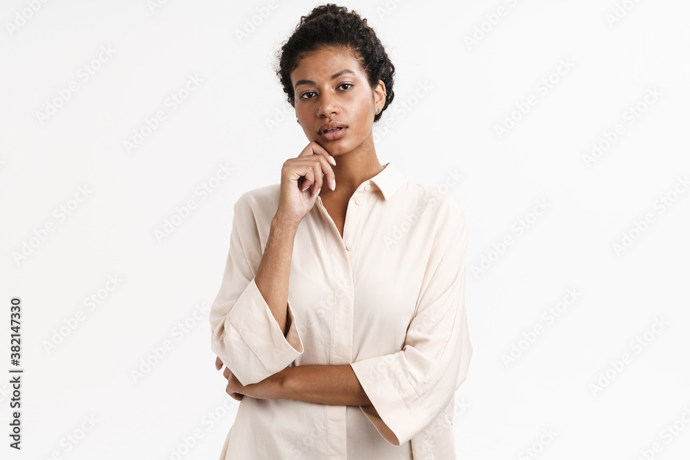 African girl posing isolated over white wall background African girl posing isolated over white wall background