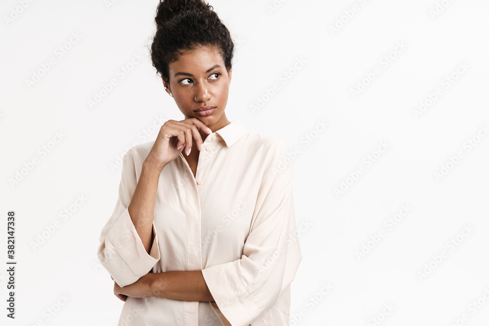 Thoughtful young african girl posing isolated Thoughtful young african girl posing isolated