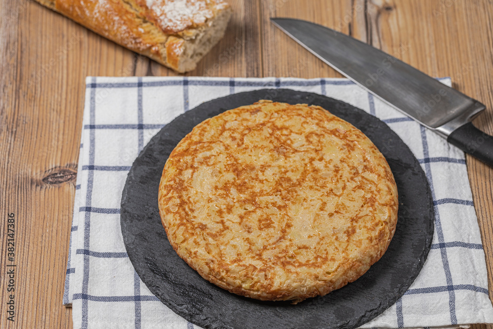 Spanish omelet with potatoes and onion, typical Spanish cuisine Spanish omelet with potatoes and onion, typical Spanish cuisine