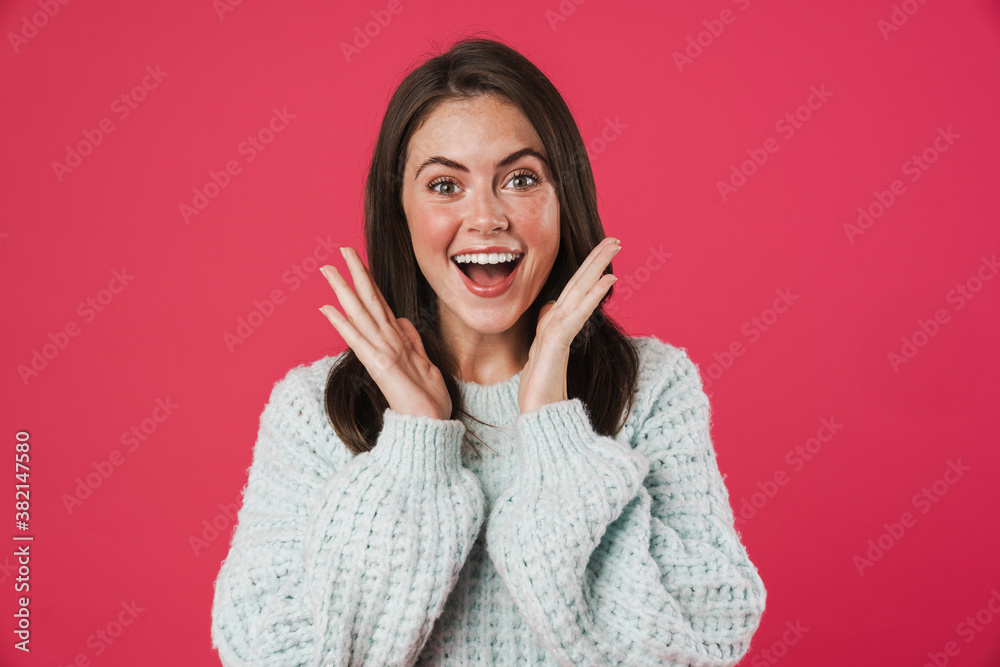 Image of excited beautiful girl expressing surprise on camera