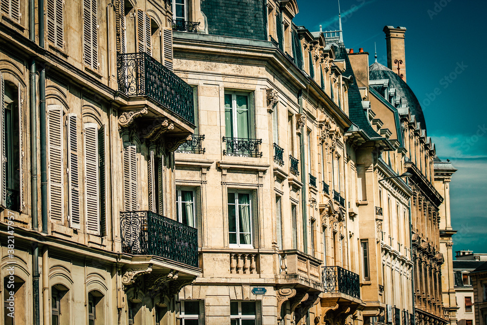 View of the facade of a building in the downtown of Reims in France
