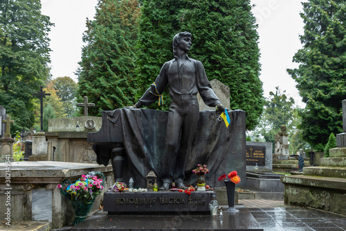 Lviv, Ukraine - 25.09.2020 : historic Lychakiv Cemetery Eastern Europe. Ancient statues and monuments. Grave Volodymyr Mykhailovych Ivasyuk was a Ukrainian songwriter, composer and poet. 