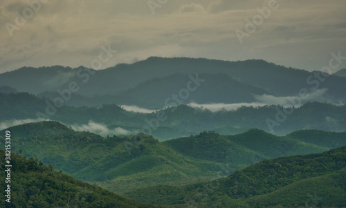 Layer of mountain from aerial view of ranong province in morning sky