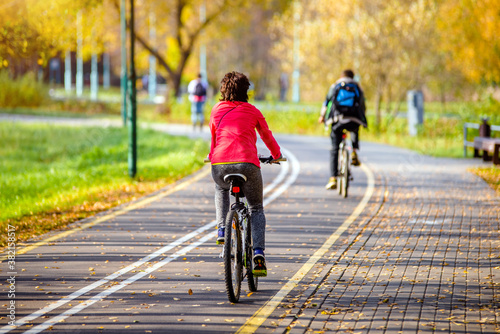 Cyclist ride on the bike path in the city Park 