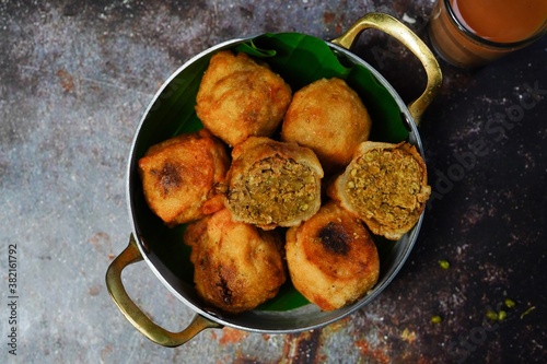 Sukhiyan - Kerala deep fried tea time snack with green gram filling, selective focus photo