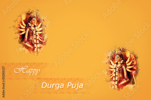 Happy Durga Puja Banner.  Hindu Goddess Devi Durga face with text and copy space in solid mustard yellow background. Indian religious festival creative image.